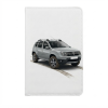 Vue de face rapprochée d'un protège-carnet blanc en similicuir, personnalisé avec l'image d'un 4x4 Dacia Duster gris sur une piste de terre, et avec des traces de pneus imprimées sur le bas de la couverture.
